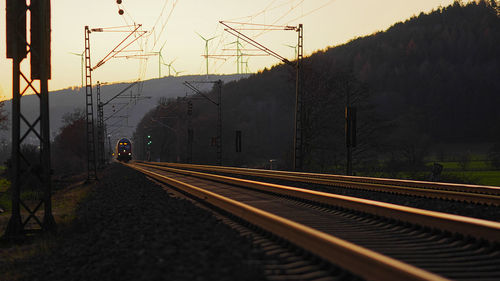 View of railroad tracks at sunset