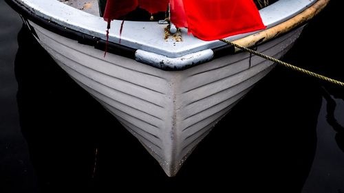 Close-up of boat moored on shore