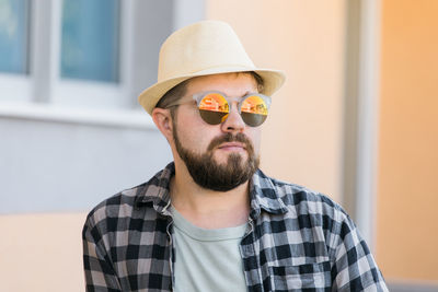 Portrait of young man wearing sunglasses