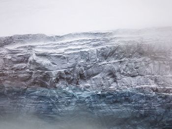 Close-up of snow on landscape