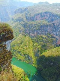 High angle view of river passing through mountains