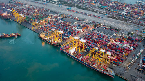 Aerial high angle view of container cargo ship and shipping port in the export and import industry 