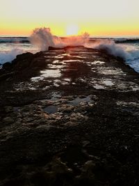 Scenic view of sunset over sea