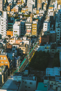 High angle view of street amidst buildings in city