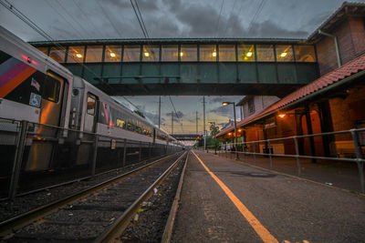 Railroad station platform at dusk