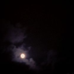 Low angle view of moon in sky