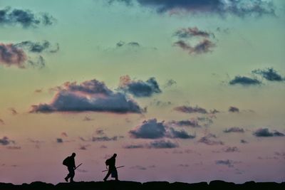 Man looking at sunset