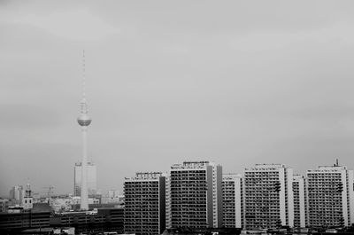 Skyscrapers in city against sky