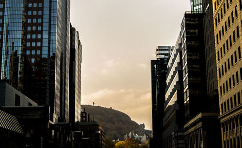 Modern cityscape against sky