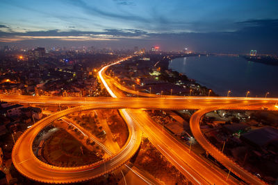 Hanoi cityscape by twilight period with road junction and interchange overpass vinh tuy