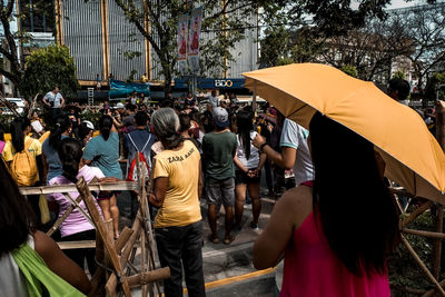 People at market stall