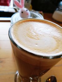 Close-up of cappuccino on table