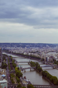 High angle view of city against cloudy sky