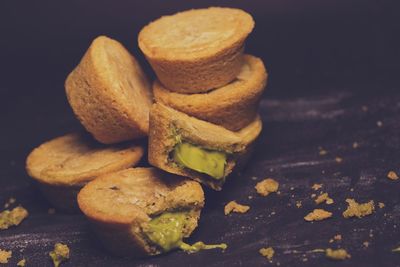 Close-up of bread on black background