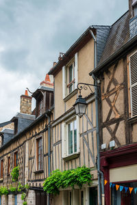 Low angle view of buildings against sky