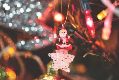 Santa claus doll hanging isolated on christmas decoration tree