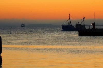 Scenic view of sea at sunset