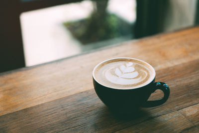 Coffee cup on table