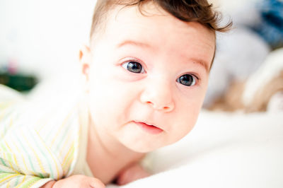 Cute baby boy on bed