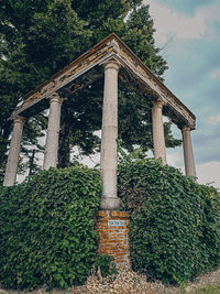 Low angle view of historical building in garden