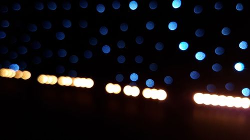 Defocused image of illuminated light bulb