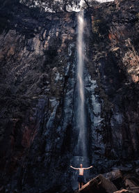 Scenic view of waterfall in forest