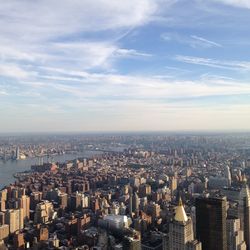 High angle view of city buildings against sky