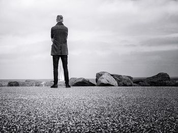 People standing on rock