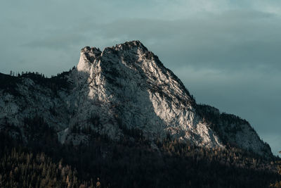 Rock formations on mountain against sky