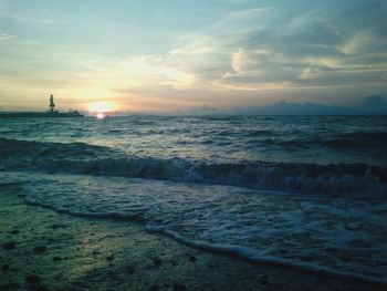 Scenic view of sea at sunset