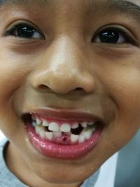 Close-up portrait of smiling boy