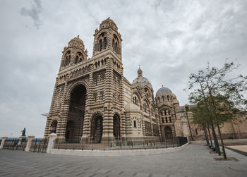 Low angle view of historical building against sky