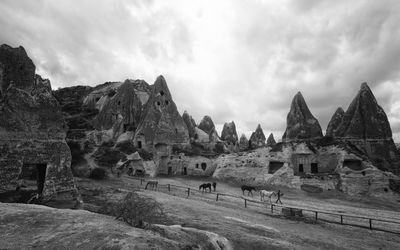 Panoramic view of mountain against cloudy sky