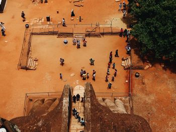 High angle view of people walking on steps