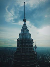 View of building against cloudy sky