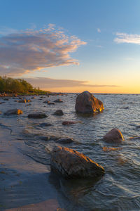 Scenic view of sea against sky during sunset