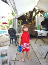 Portrait of girl standing outdoors