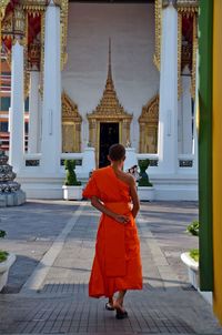Rear view of woman in temple