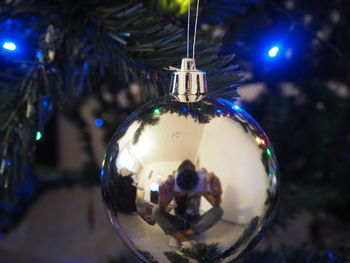 Close-up of christmas decorations on tree