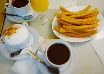 High angle view of breakfast served on table