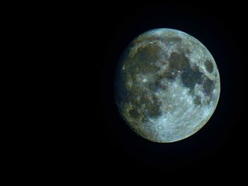 Scenic view of moon against sky at night