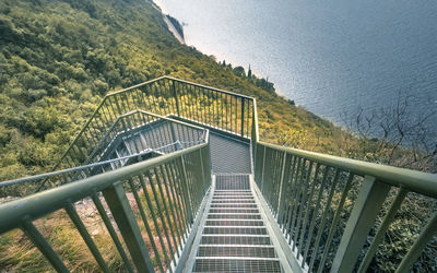 High angle view of footbridge amidst trees