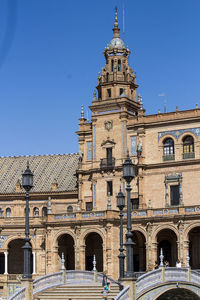 Low angle view of a building against blue sky