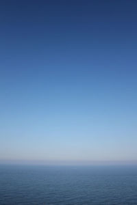 View of calm sea against clear sky