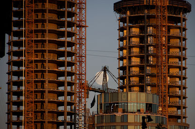 Low angle view of modern buildings against sky