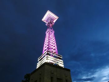 Low angle view of tower against blue sky