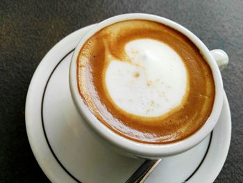 Close-up of cappuccino on table