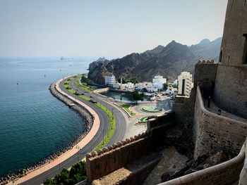 High angle view of beach against sky in city