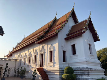 Low angle view of traditional building against clear sky