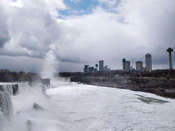 Panoramic view of city against sky during winter